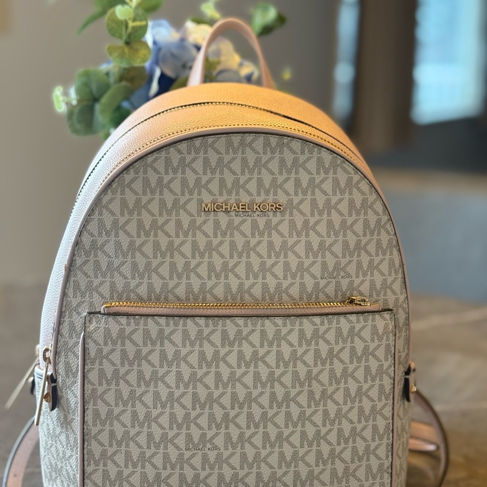 Michael Kors  Baby Pink andWhite stamped with the MKs ….pretty bag!!